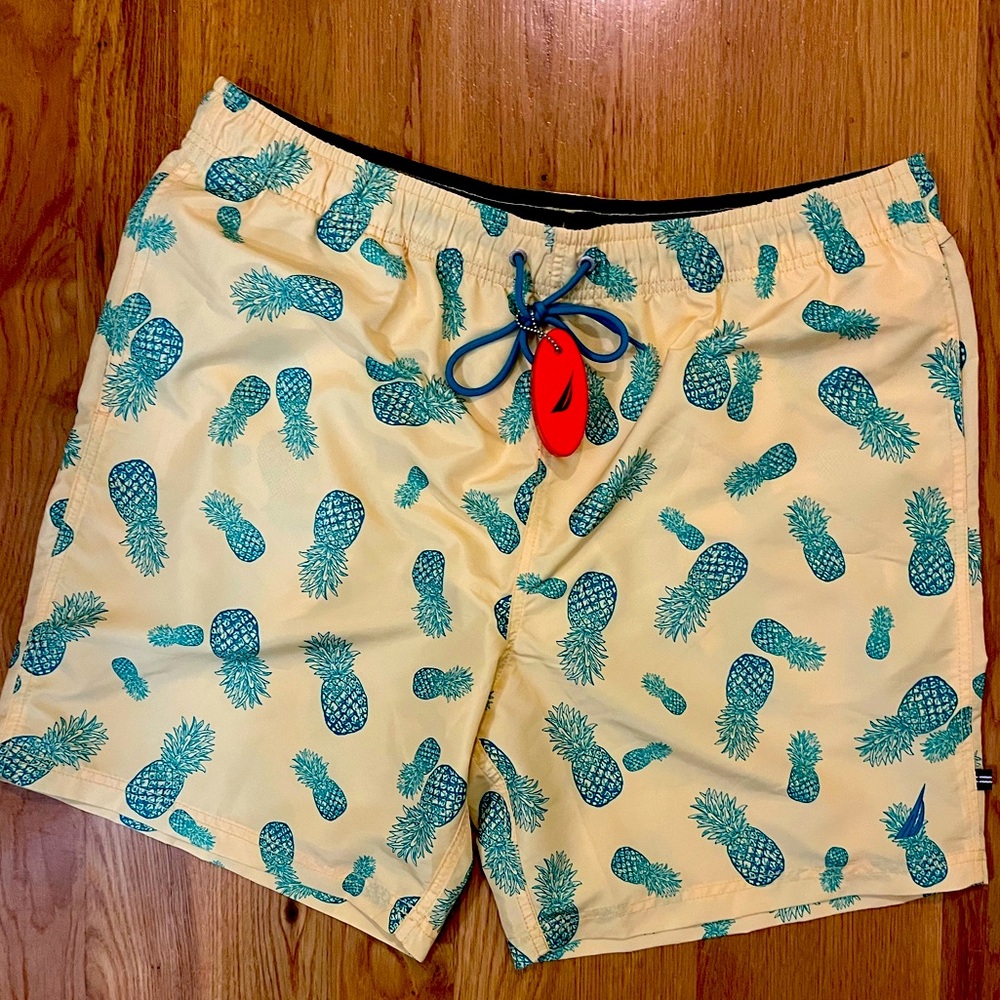 Men’s Nautica swim trunks yellow with green pineapple print. Size XL